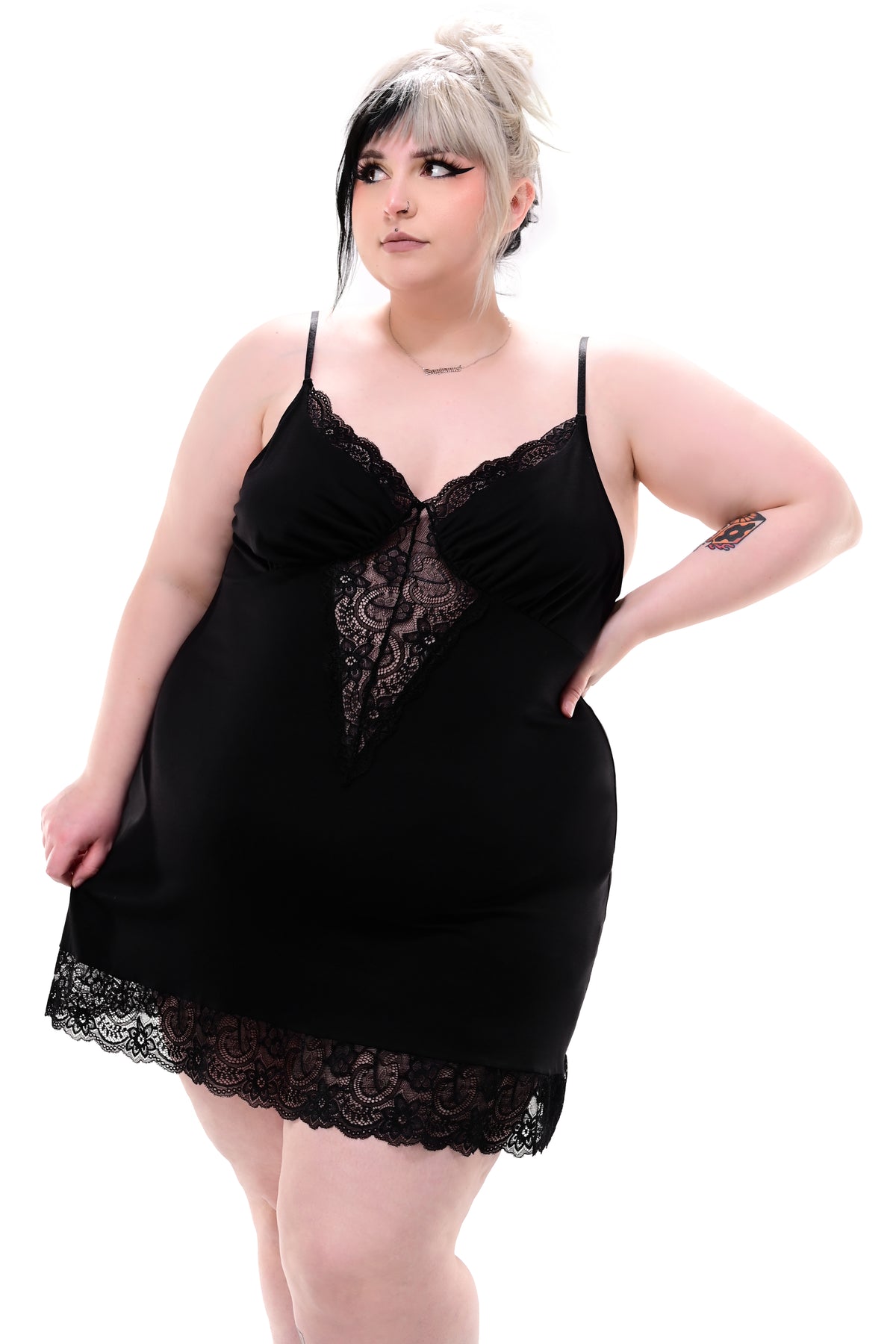 short black slip dress with lace trim and front/back lace panels