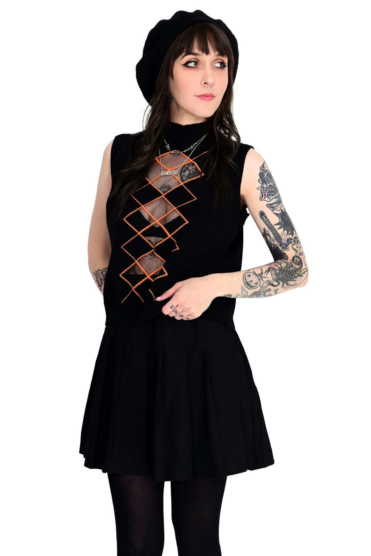 black sweater vest with orange and mesh argyle panel on front