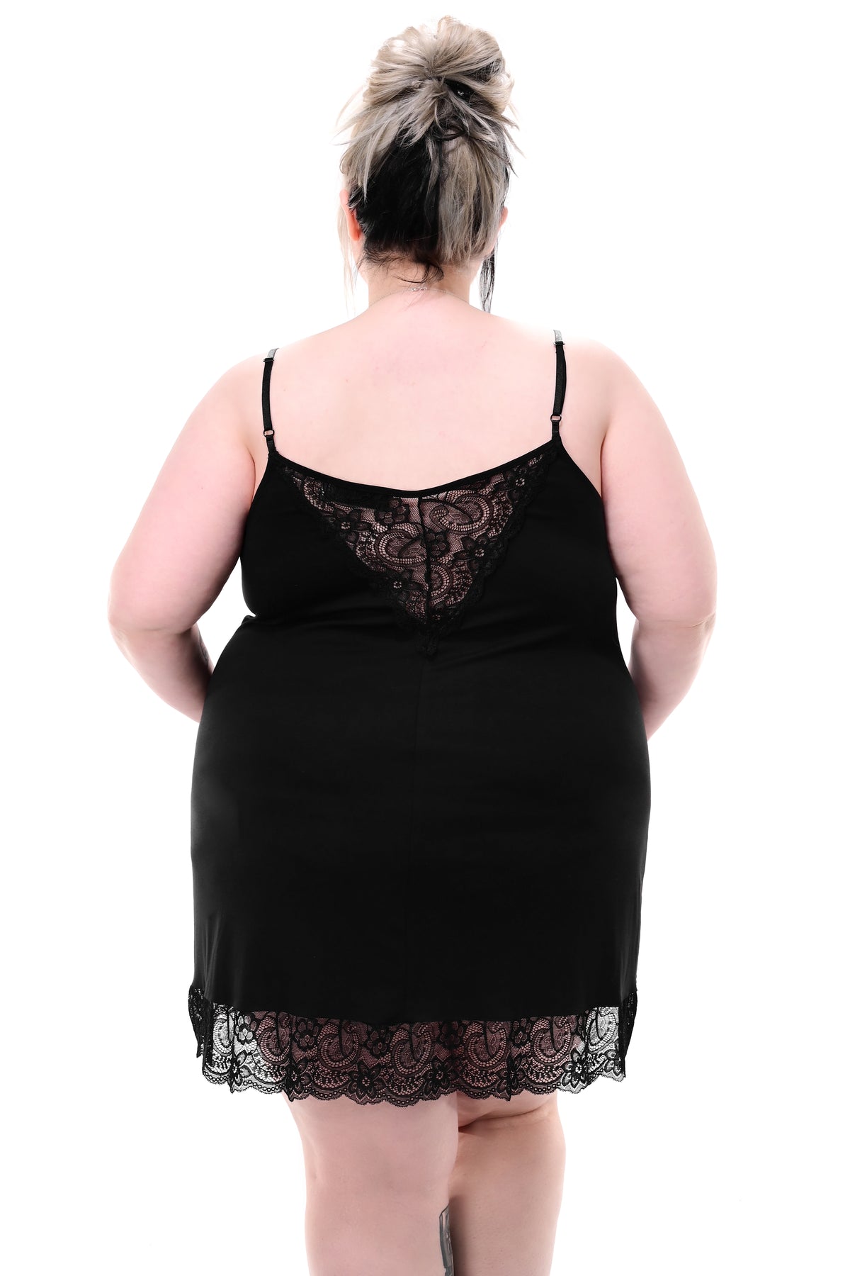 short black slip dress with lace trim and front/back lace panels