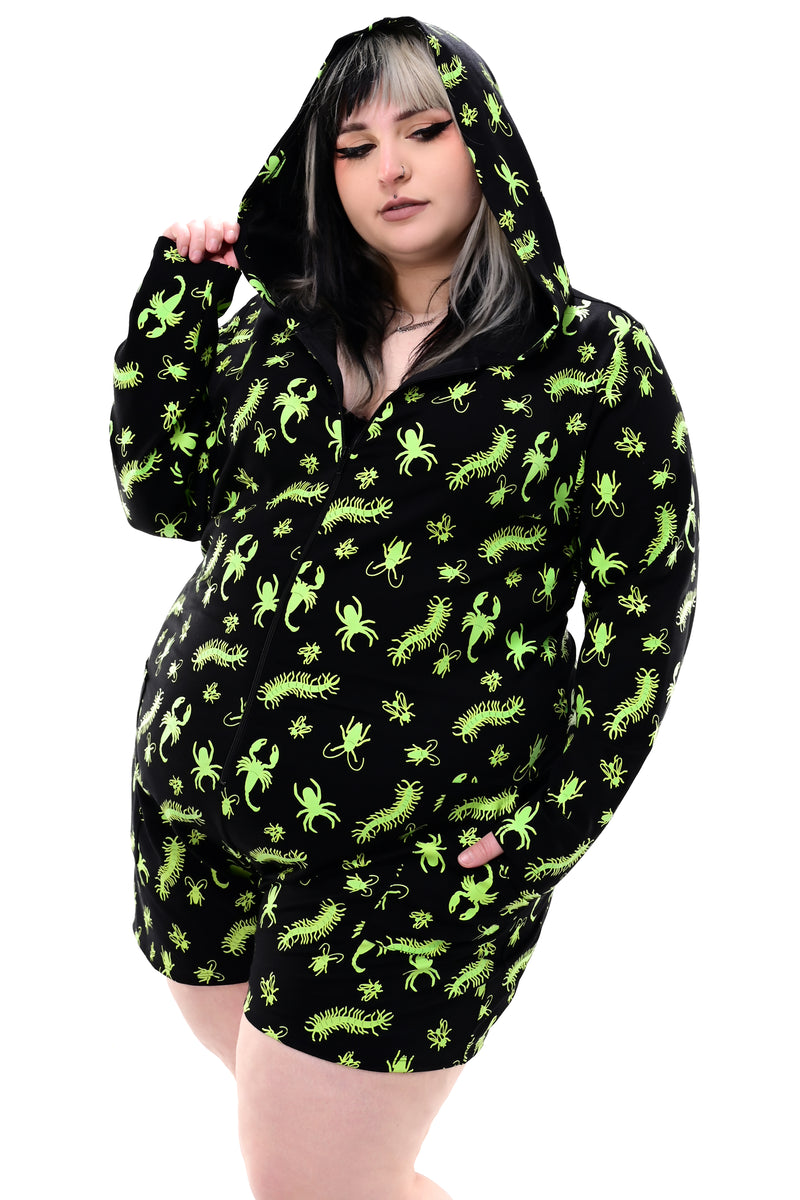 black long sleeve roper with green glow in the dark bugs print, zip up front and a hood