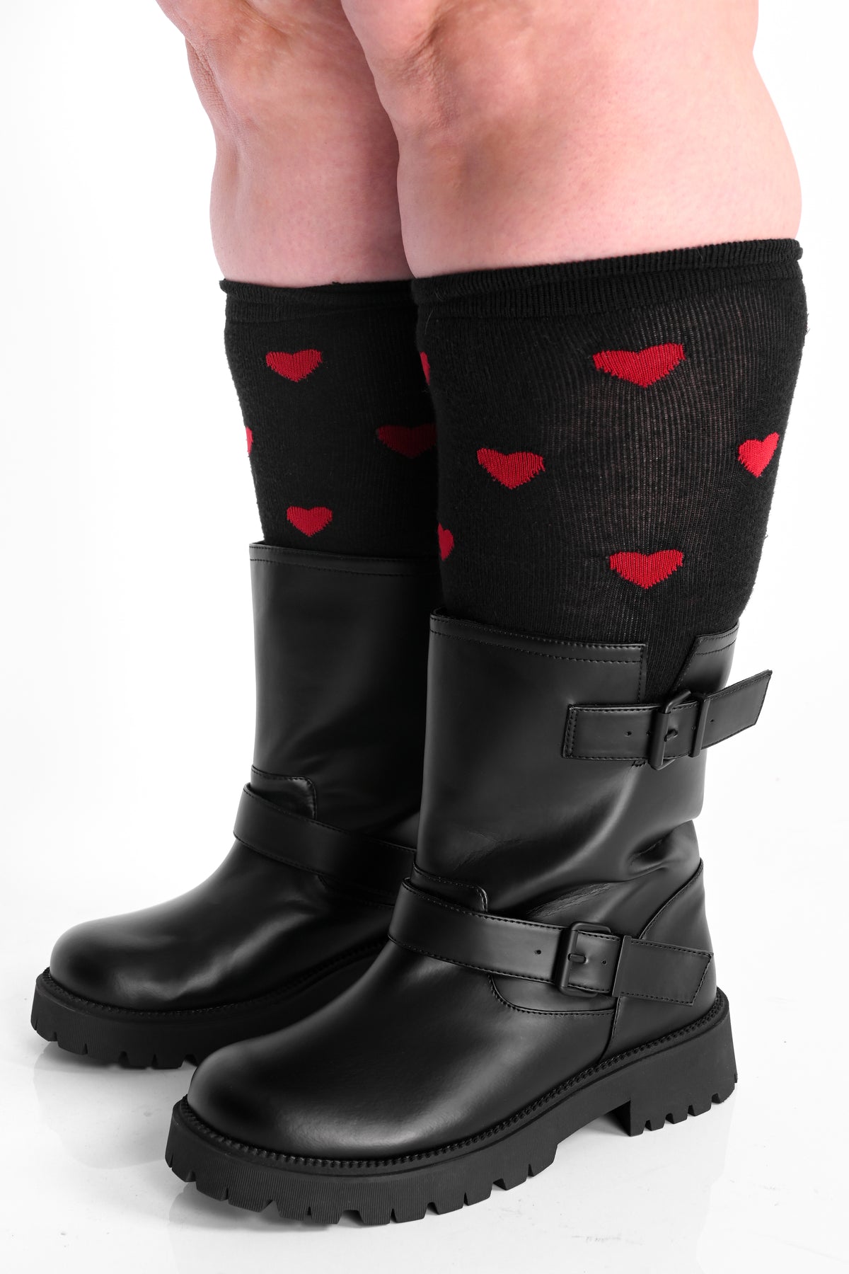 black rainboots with buckles and straps