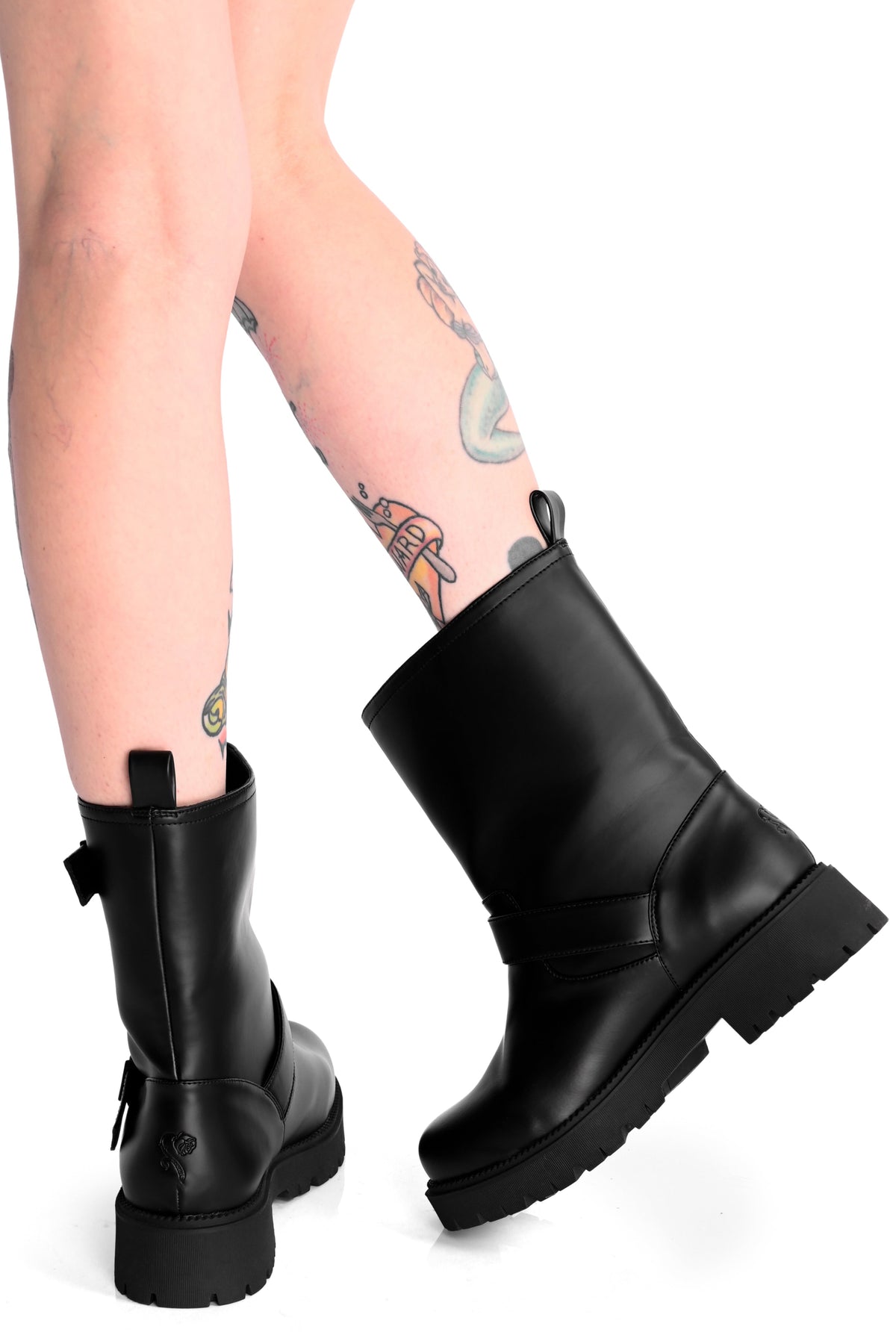black rainboots with buckles and straps