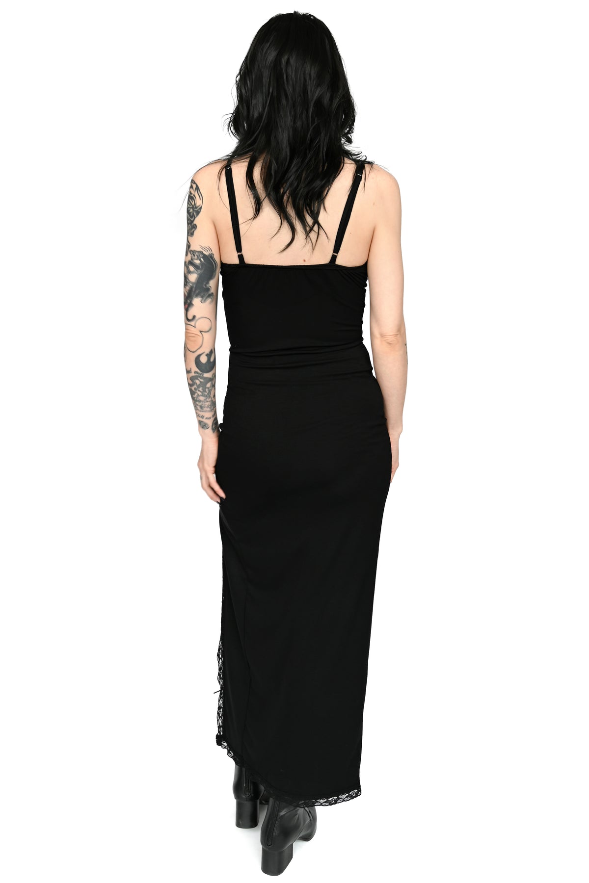 black maxi length dress with lace trim, spaghetti straps, and adjustable keyhole