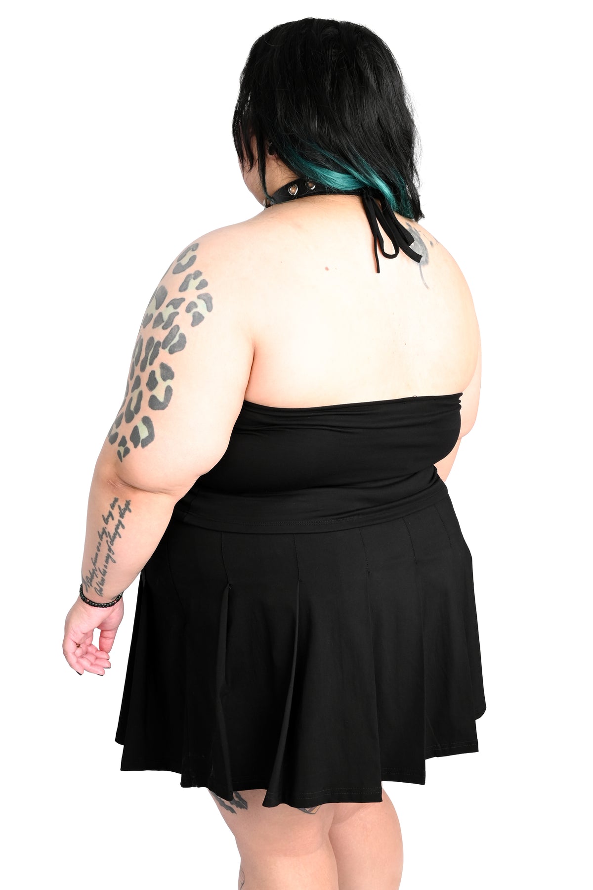 Black halter top with adjustable halter tie.