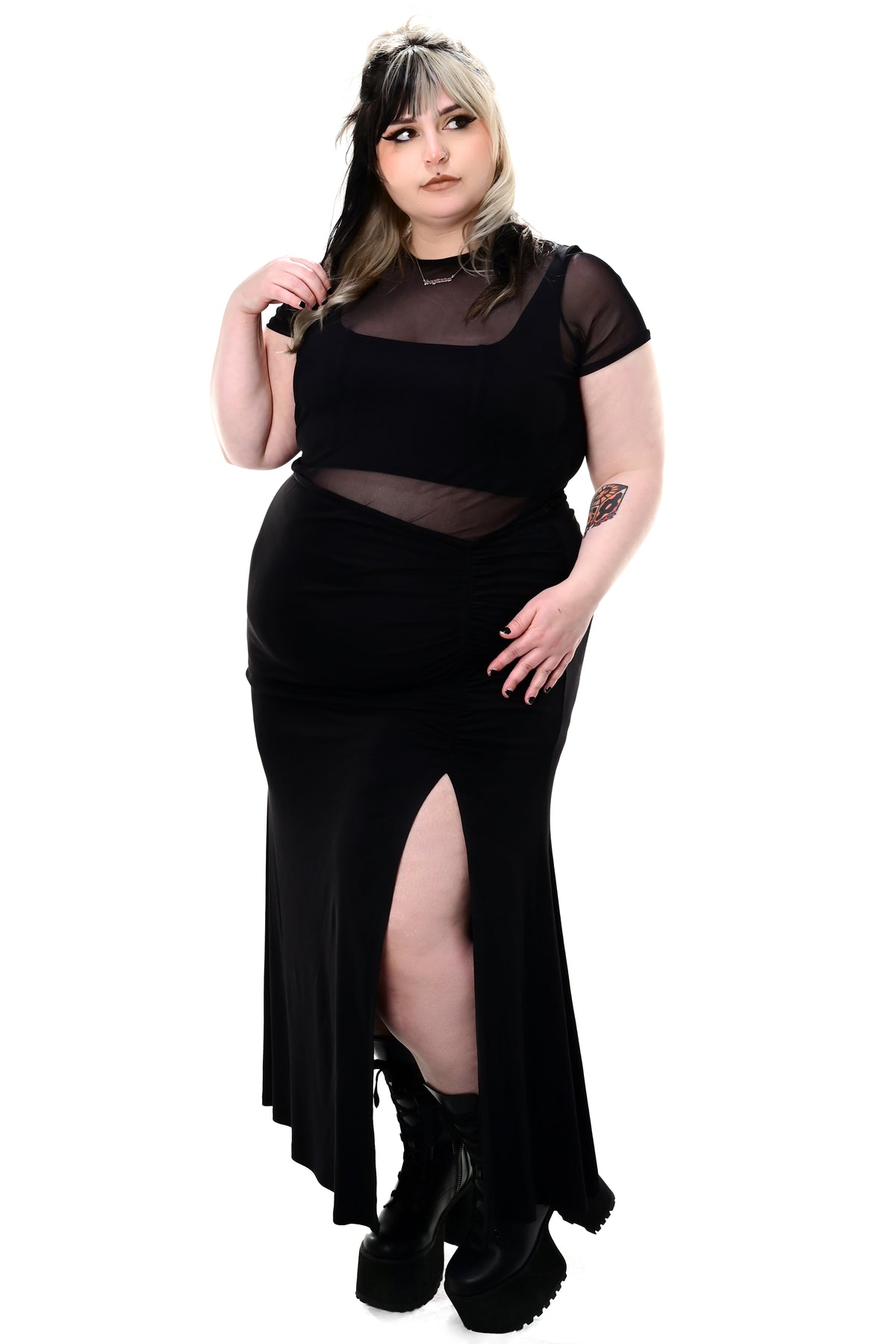 black maxi skirt with asymmetrical waistline, side slit and slight mermaid flare