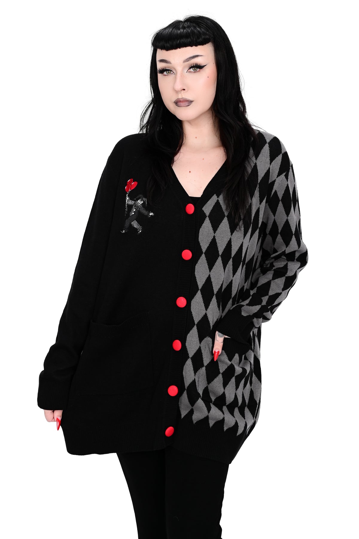 Black cardigan split with black and grey diamond pattern on one side, clown design stitched on the side and red covered buttons