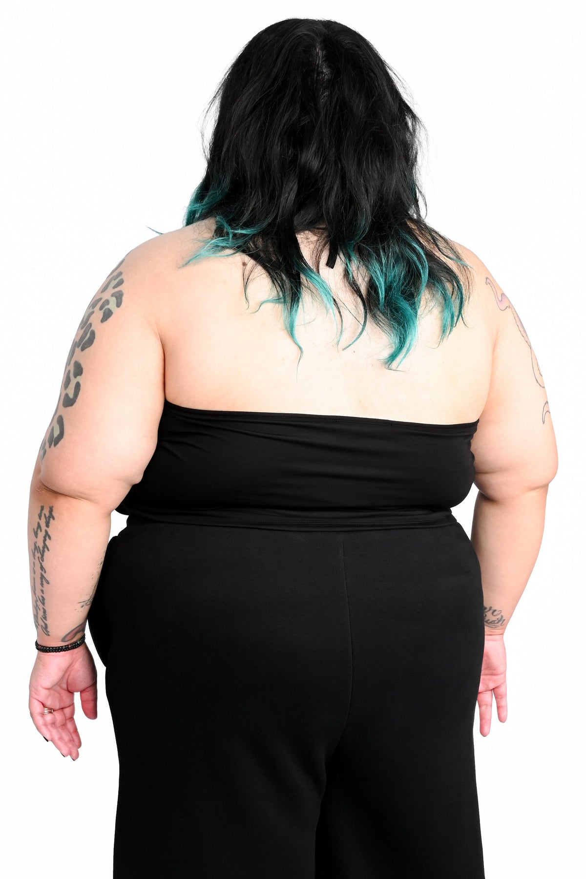 Black halter top with adjustable halter tie.