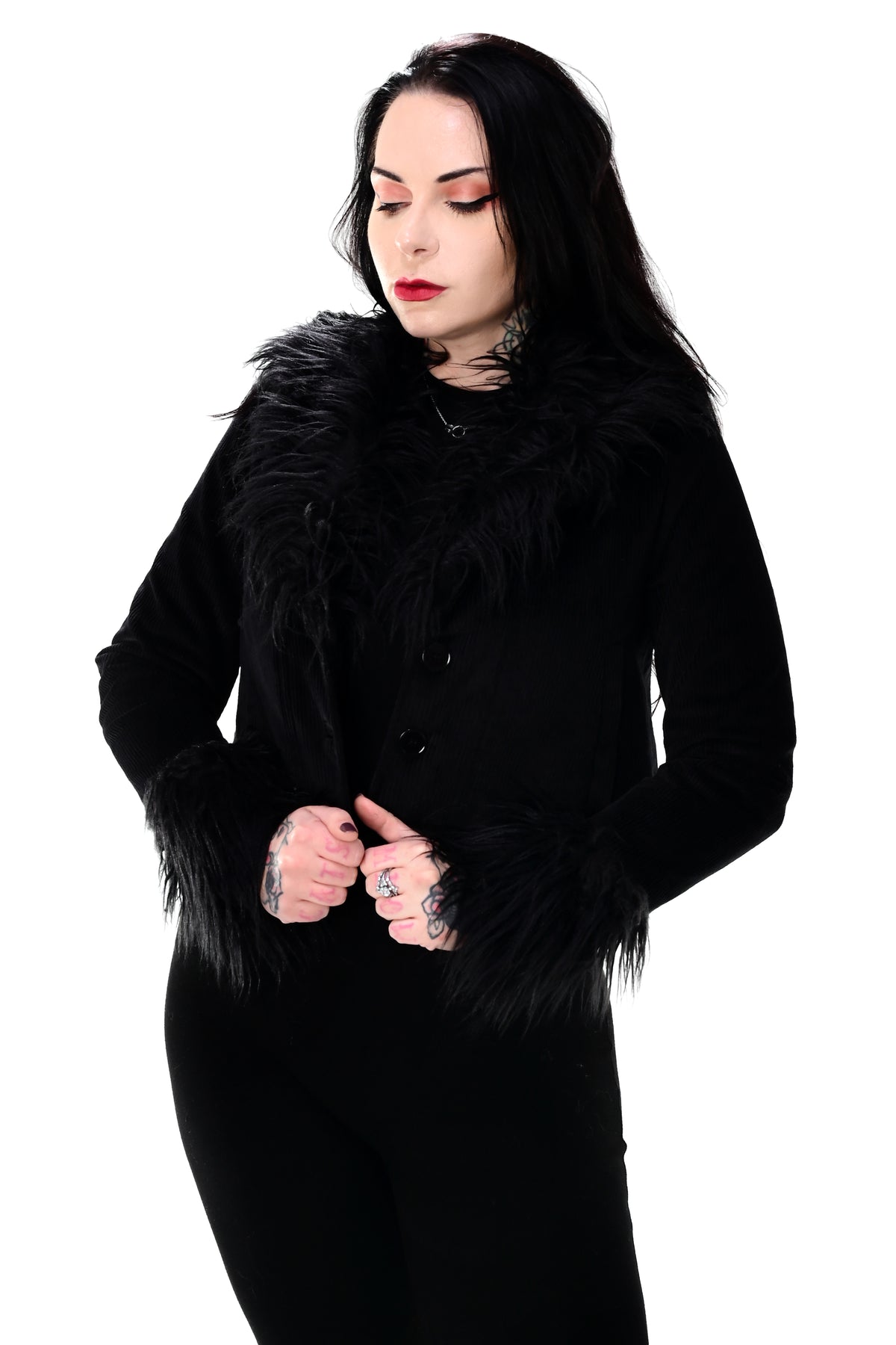 black corduroy button up jacket with black shaggy faux fur on the collar and cuffs