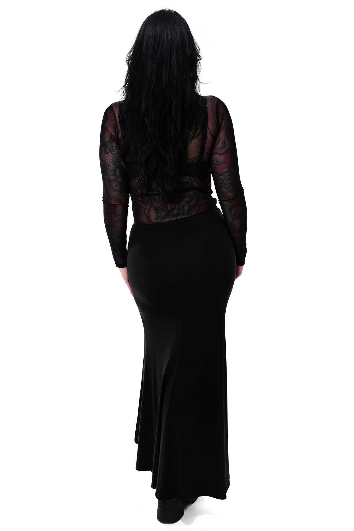 black maxi skirt with asymmetrical waistline, side slit and slight mermaid flare