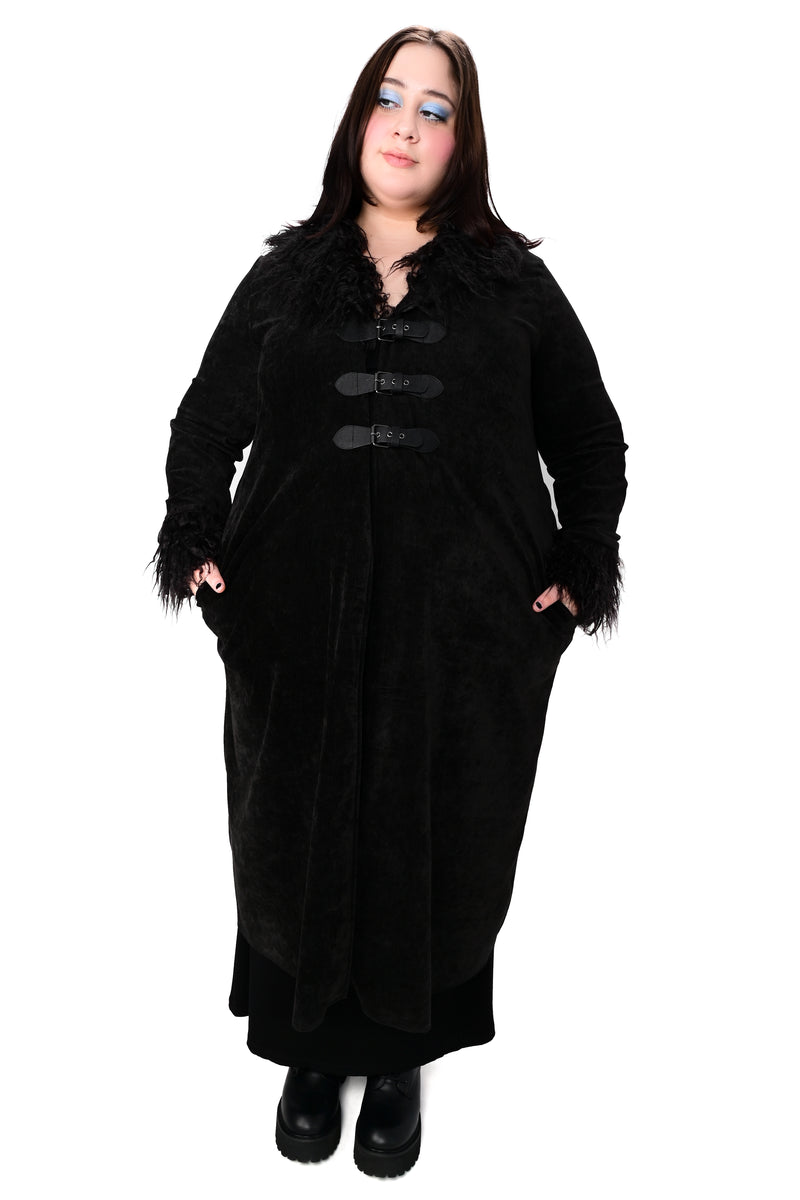 black long sleeve chenille duster with faux fur trim and 3 vegan leather buckles across the front