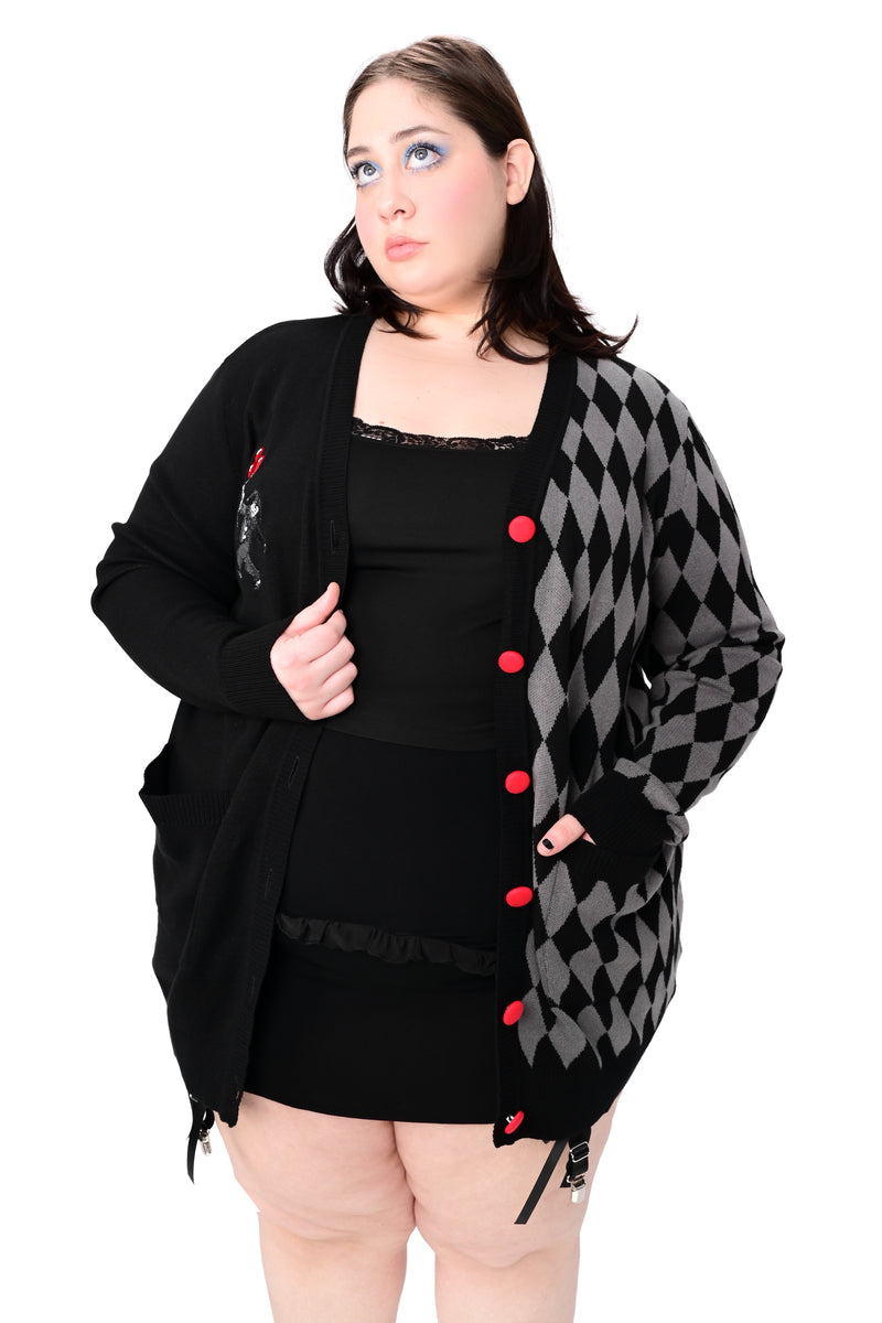 Black cardigan split with black and grey diamond pattern on one side, clown design stitched on the side and red covered buttons