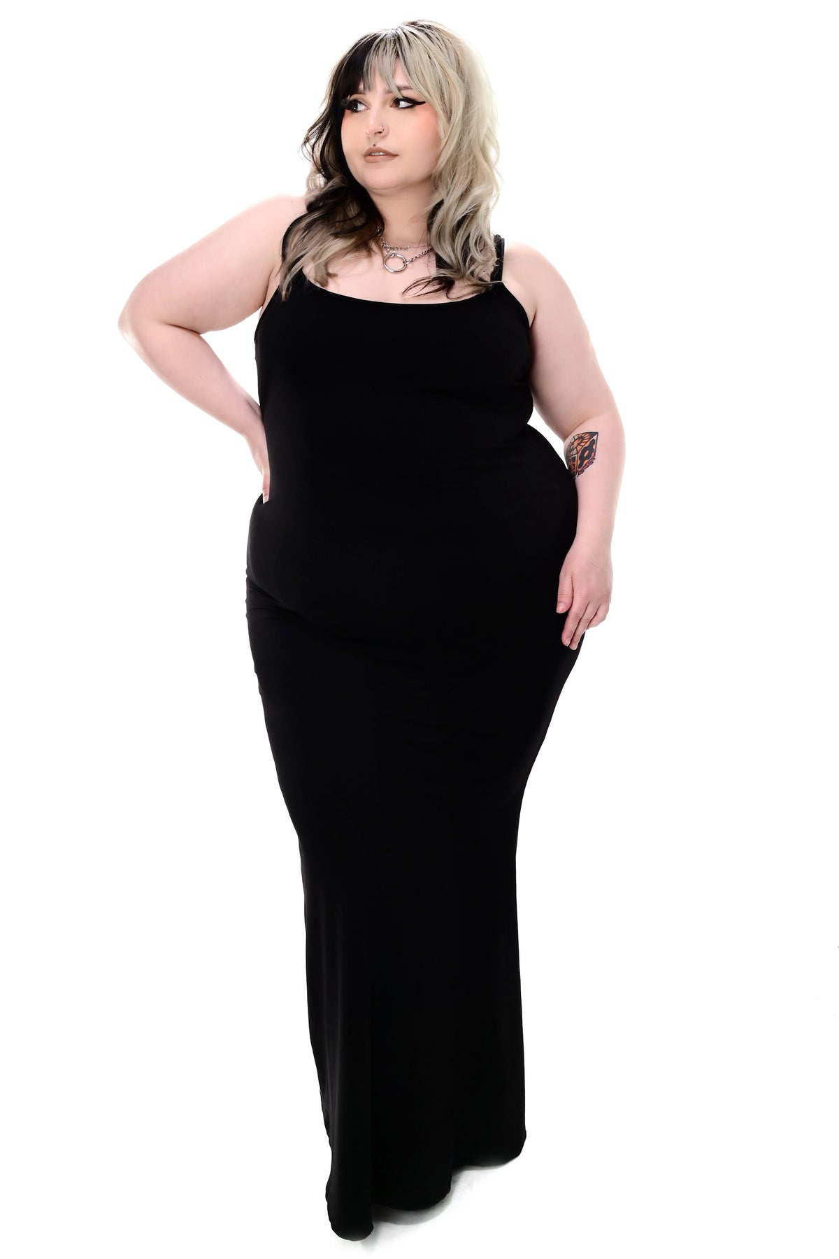 black ribbed bodycon maxi dress with adjustable straps and a slight bottom flare