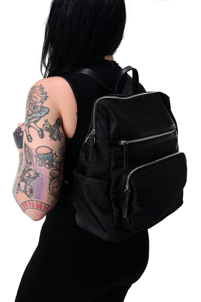 black nylon backpack with 2 front zipper pockets and shoulder strap