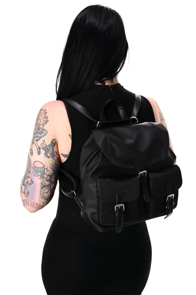 black nylon backpack with front pockets