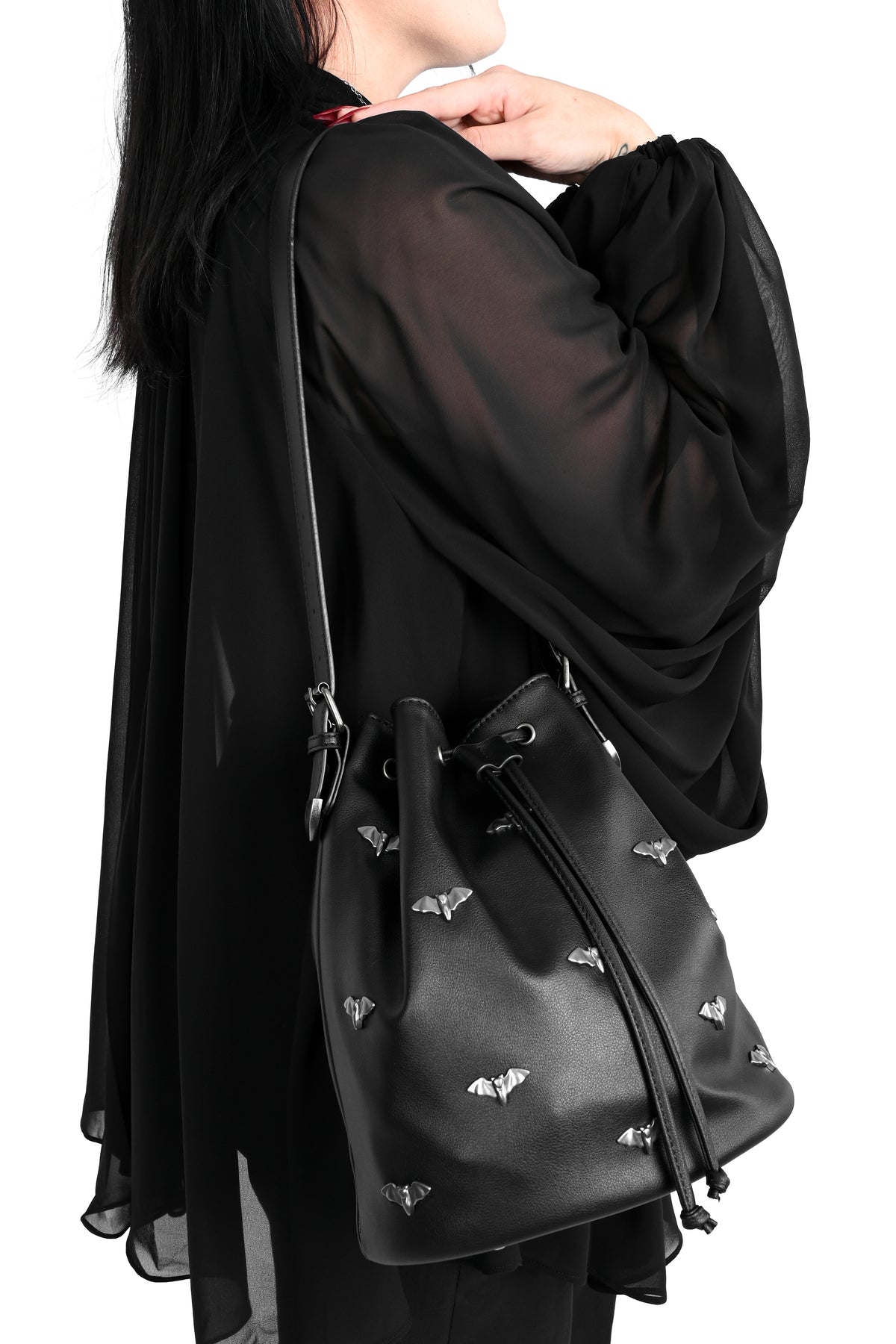 bucket bag with bat studs all over