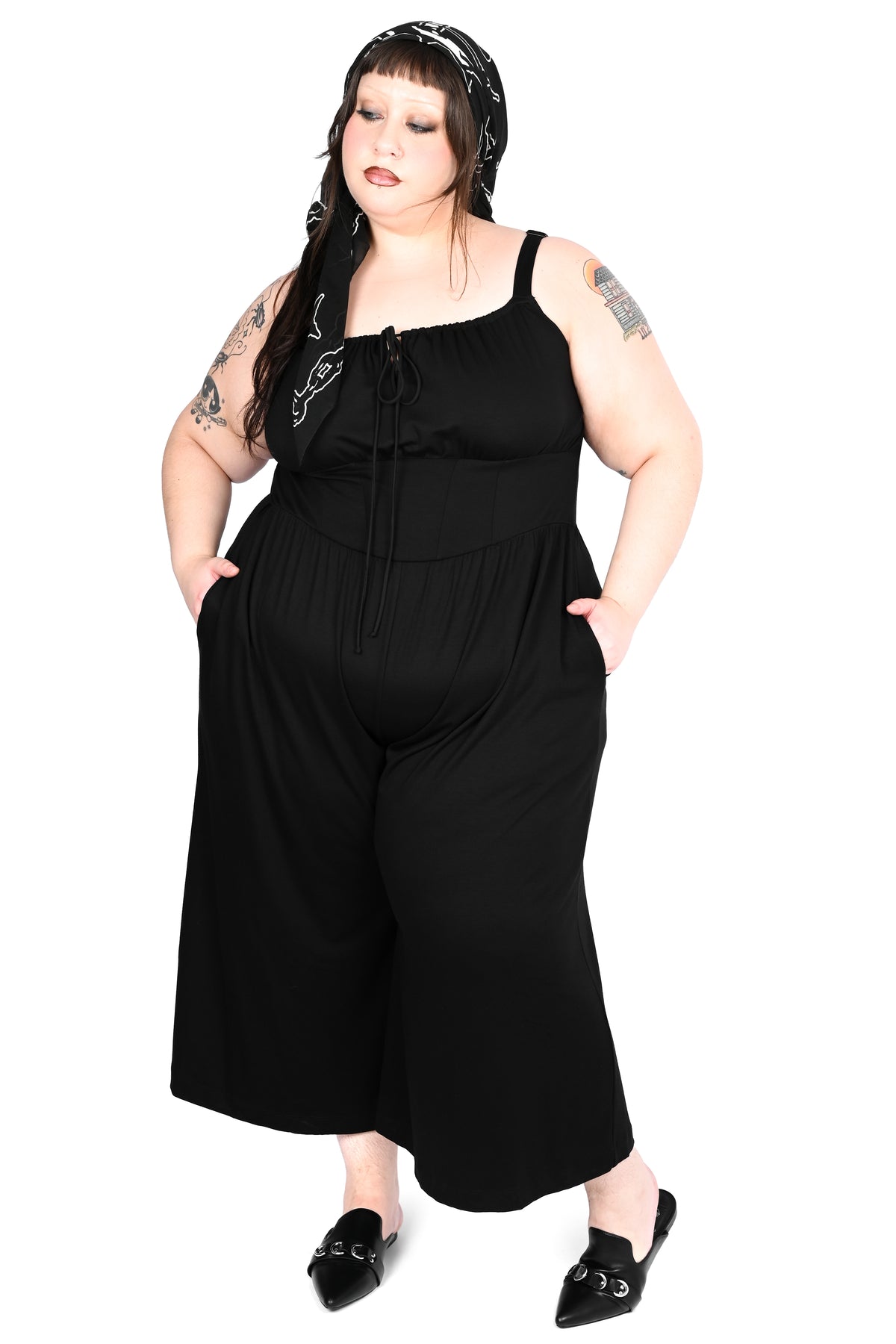 Black wide leg jumpsuit with keyhole tie on front.