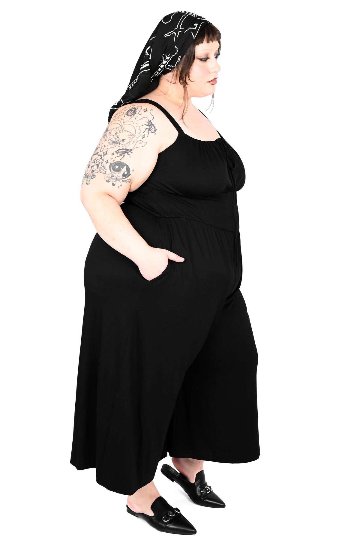 Black wide leg jumpsuit with keyhole tie on front.