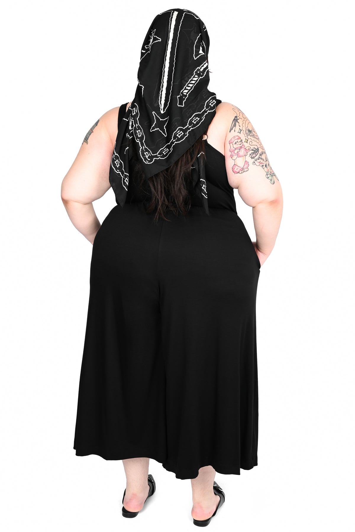 Black wide leg jumpsuit with keyhole tie on front.