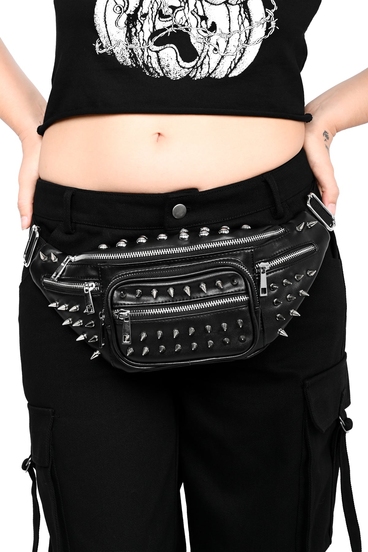Black PU fanny pack covered in silver studs.