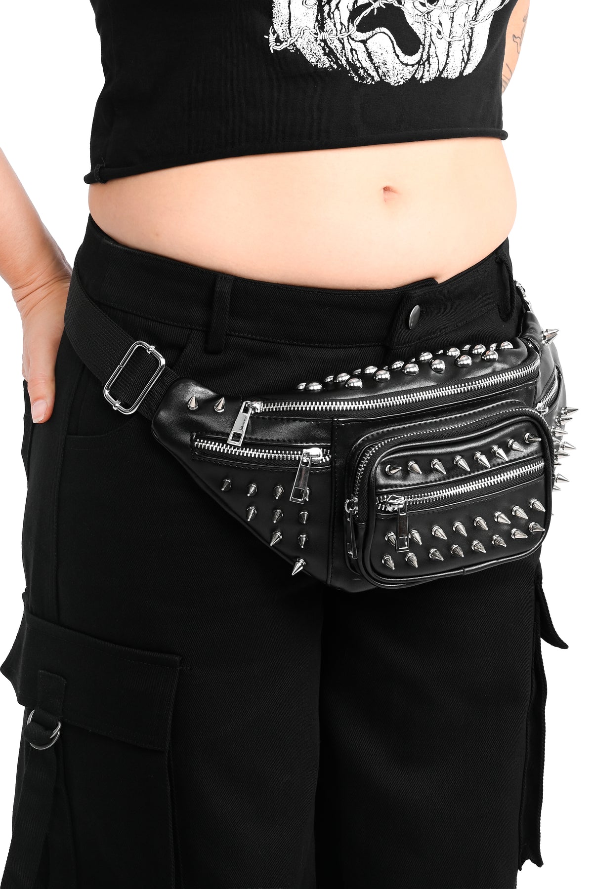 Black PU fanny pack covered in silver studs.