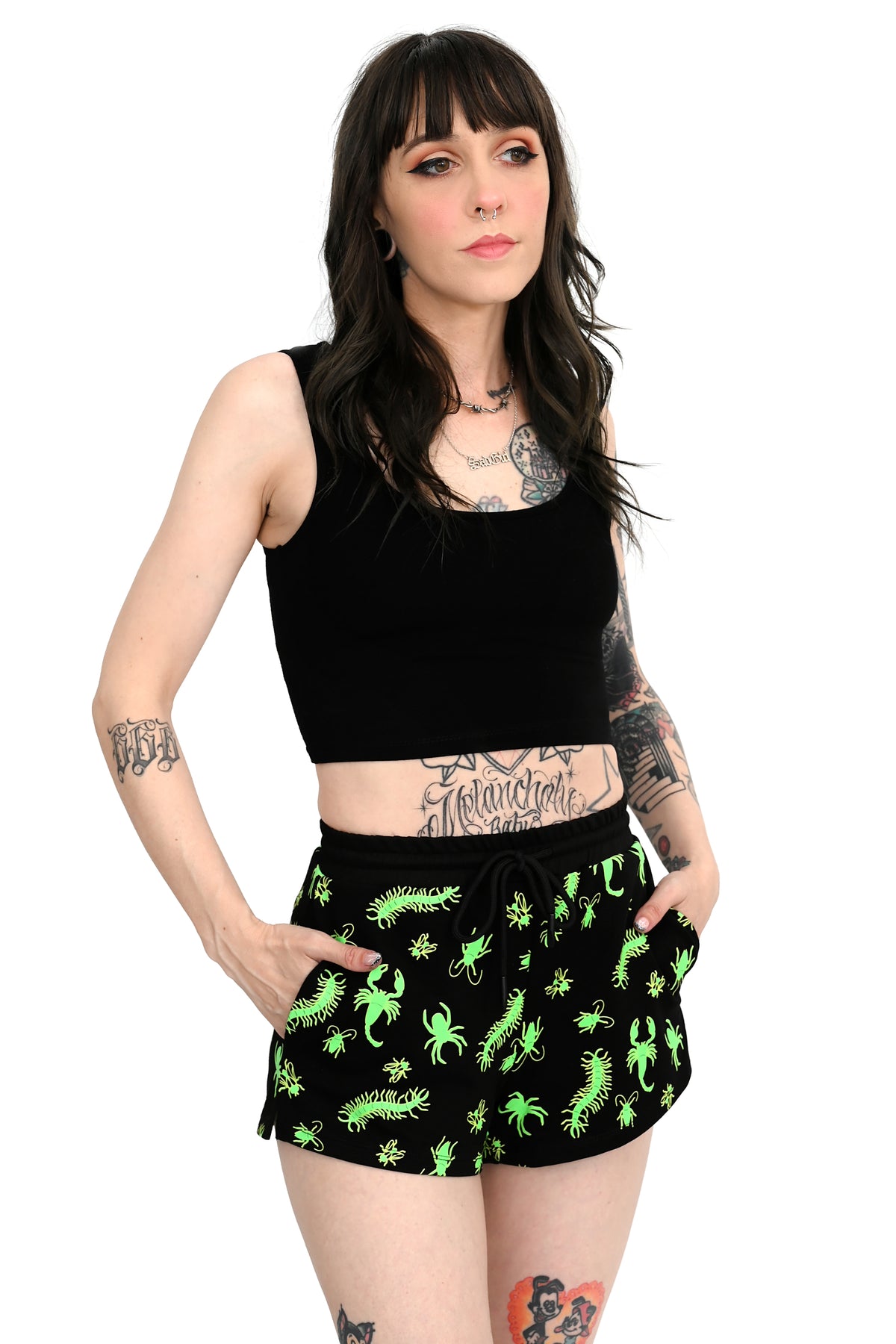 black shorts with with green glow in the dark bug print