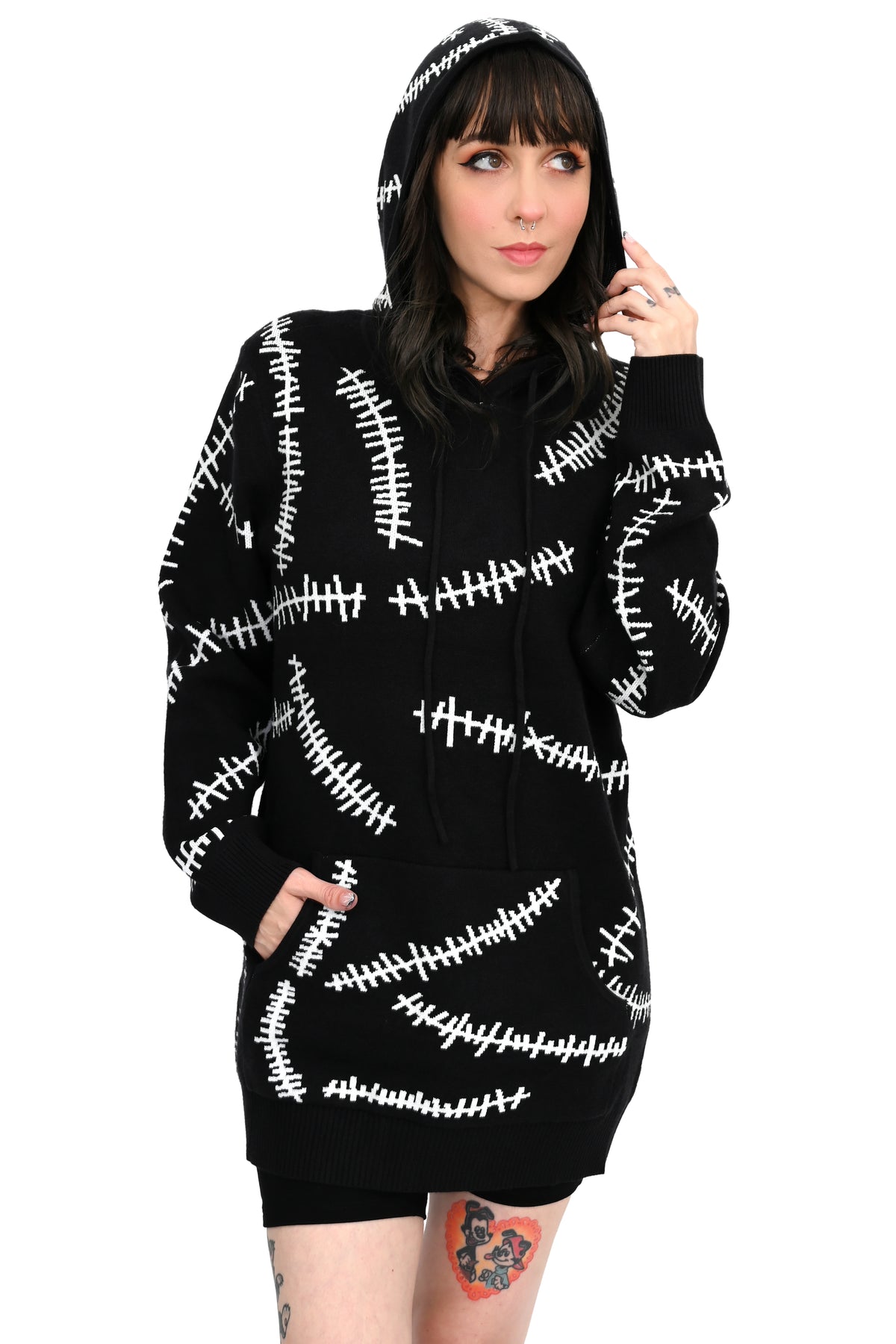 black hoodie with white glow in the dark stitch pattern
