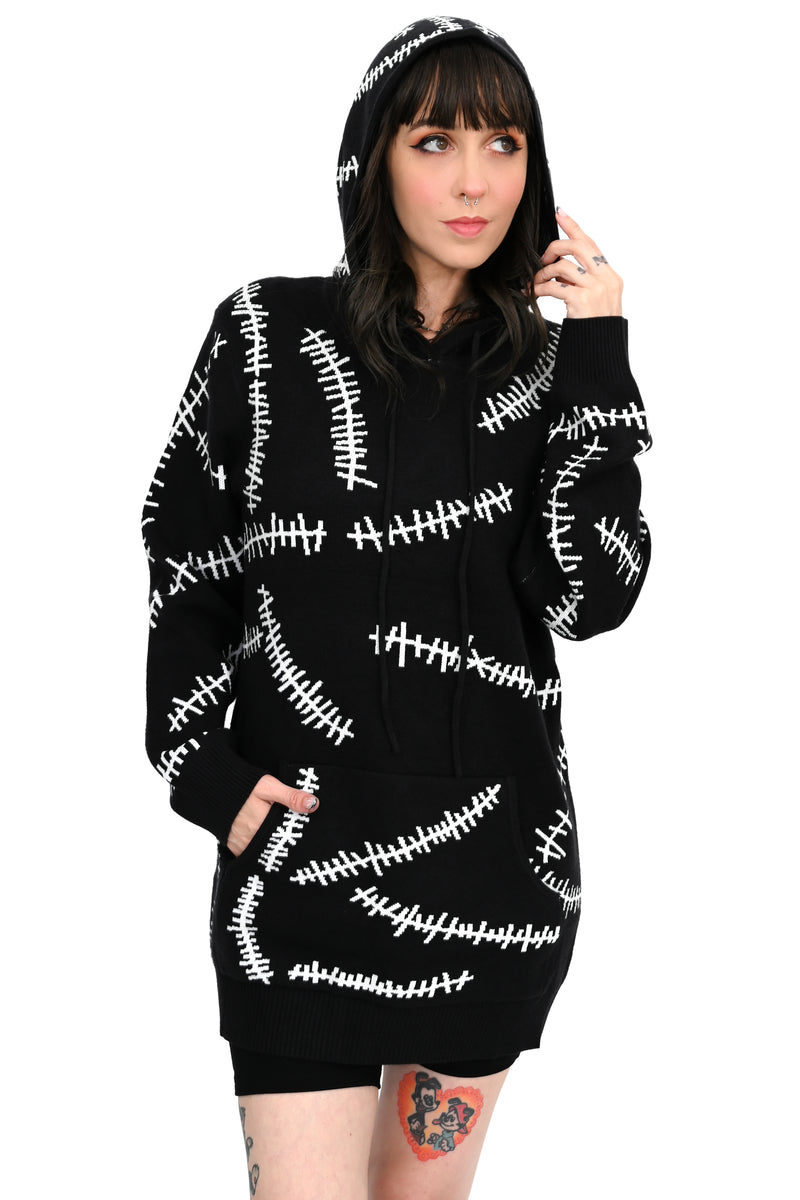 black hoodie with white glow in the dark stitch pattern