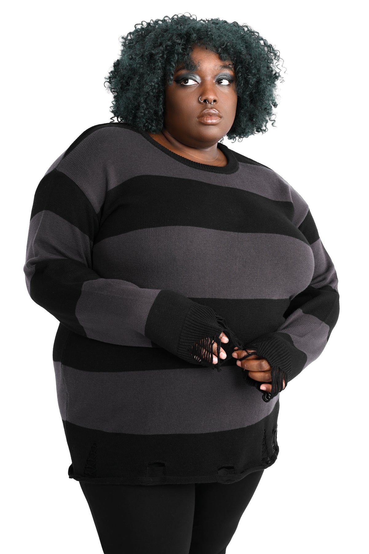 Black and grey striped sweater tunic with distressing on the bottom hem and cuffs