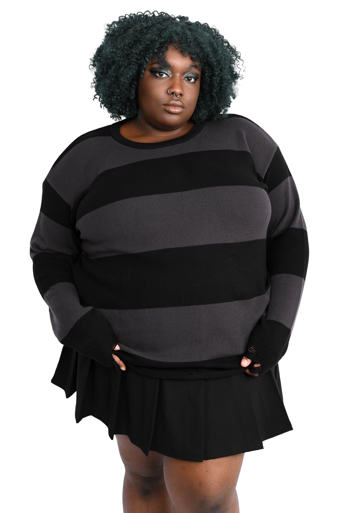 Black and grey striped sweater tunic with distressing on the bottom hem and cuffs