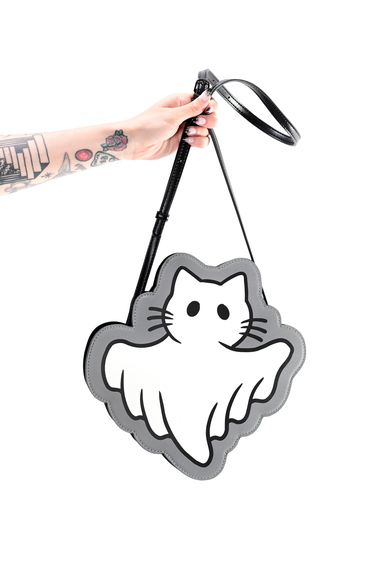 black and grey crossbody bag with white ghost cat design