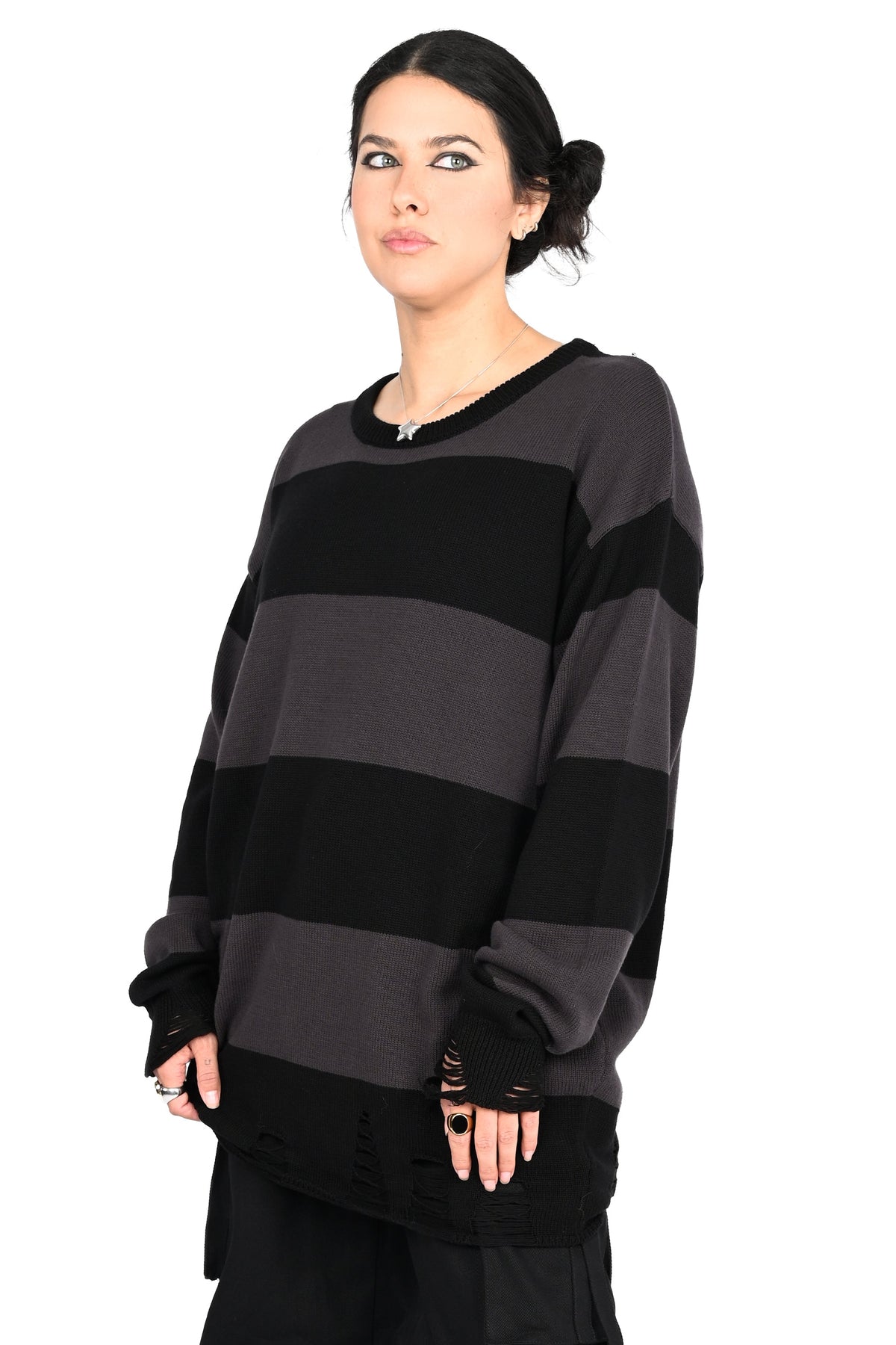 Black and grey striped sweater tunic with distressing on the bottom hem and cuffs