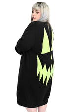 black sweater duster with green glow in the dark jackolantern face on back