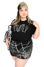 black t-shirt with "haunted" printed on front