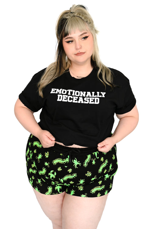 black t-shirt with "emotionally deceased" printed on front
