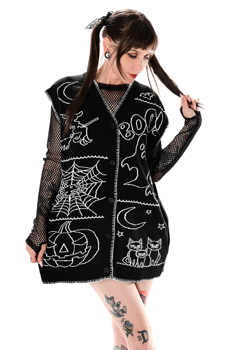 black button up sweater vest with halloween patchwork pattern and white stitching