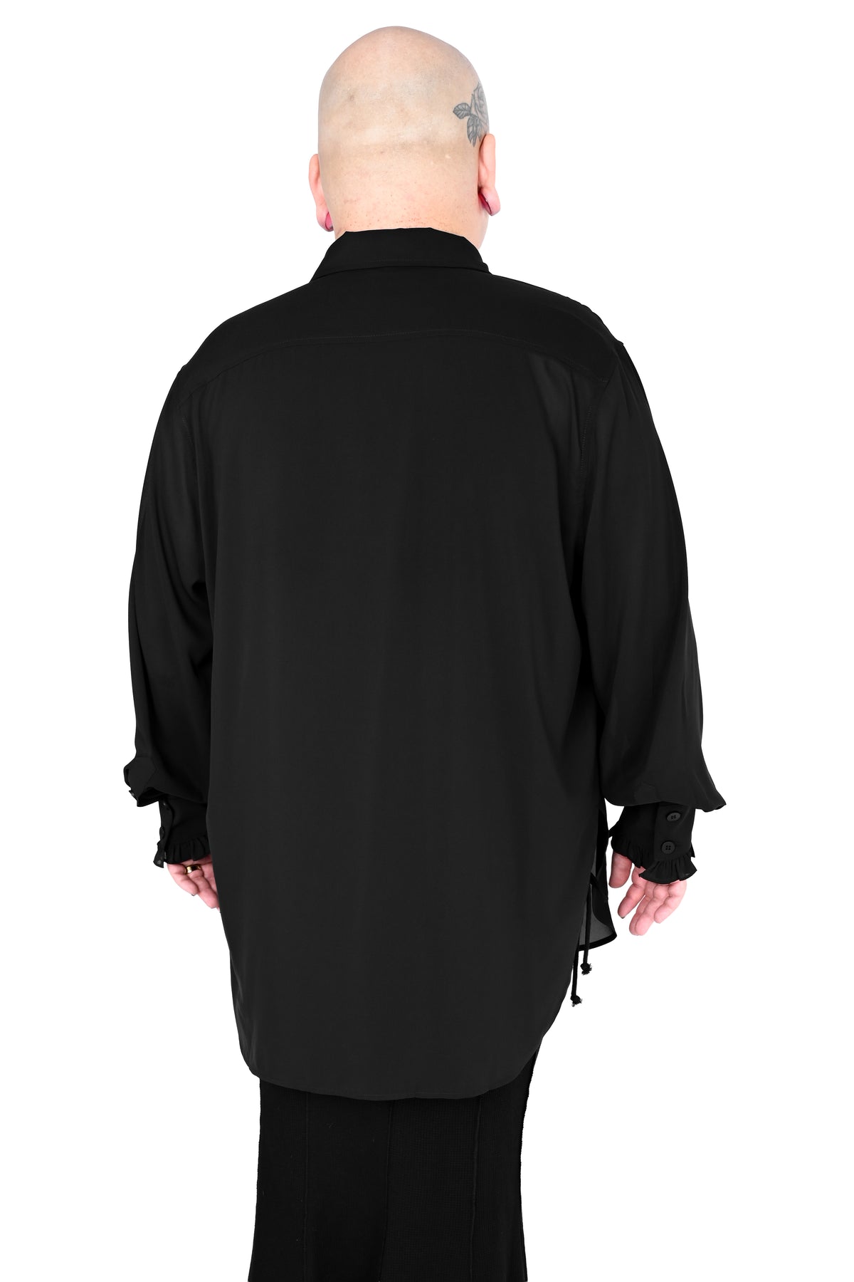 back view of a model wearing a black chiffon shirt in size 2xl