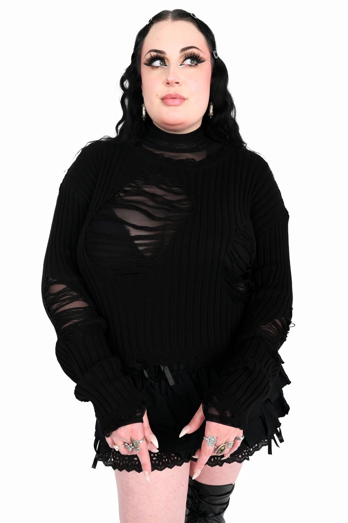 black ribbed shredded sweater with distressing all over