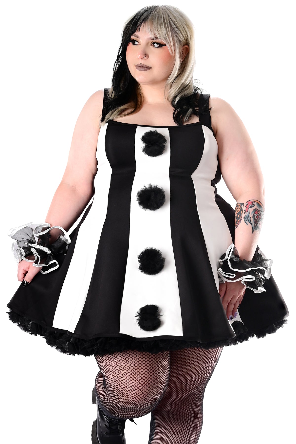 black and white striped clown dress with black tulle pom poms on front