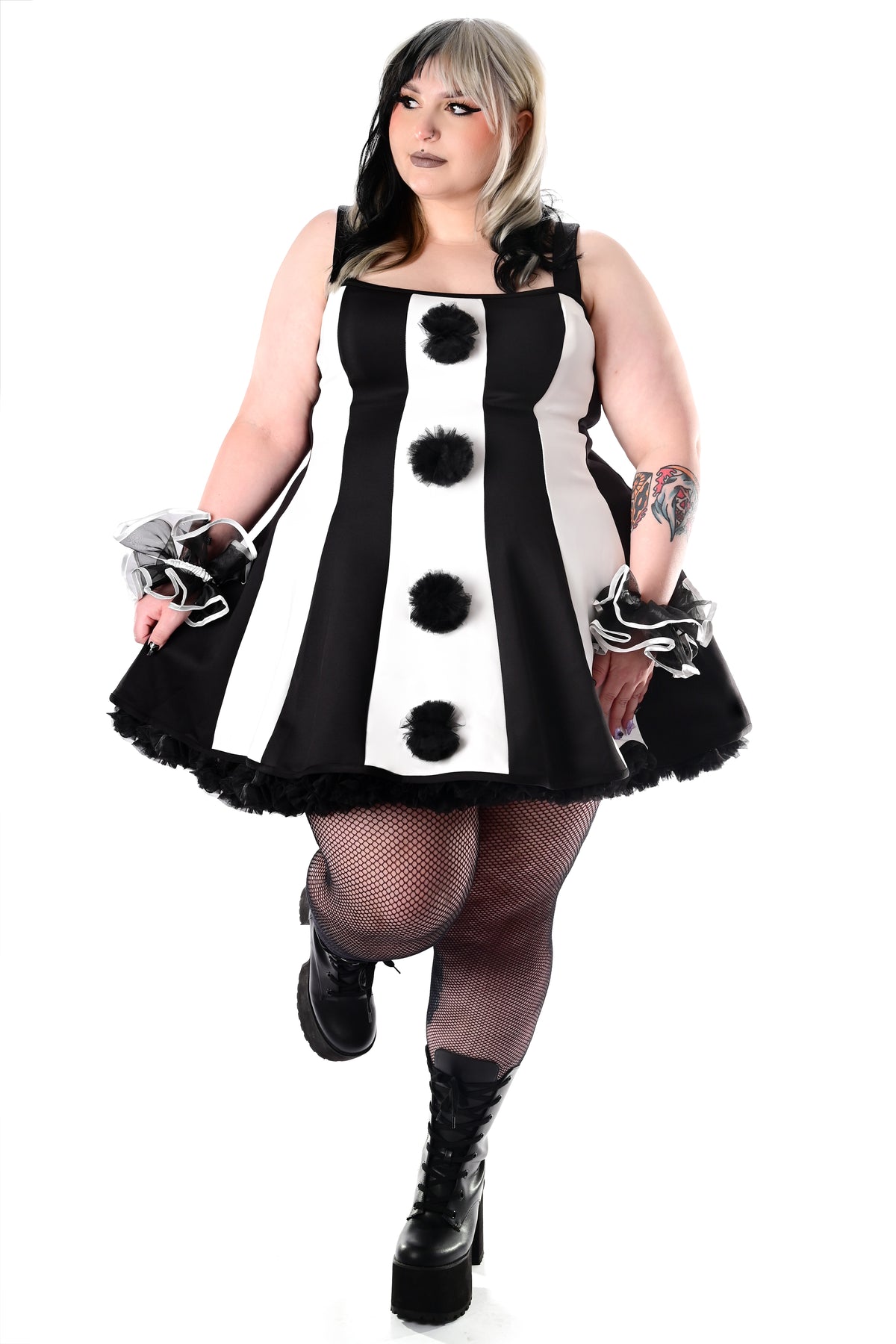 black and white striped clown dress with black tulle pom poms on front