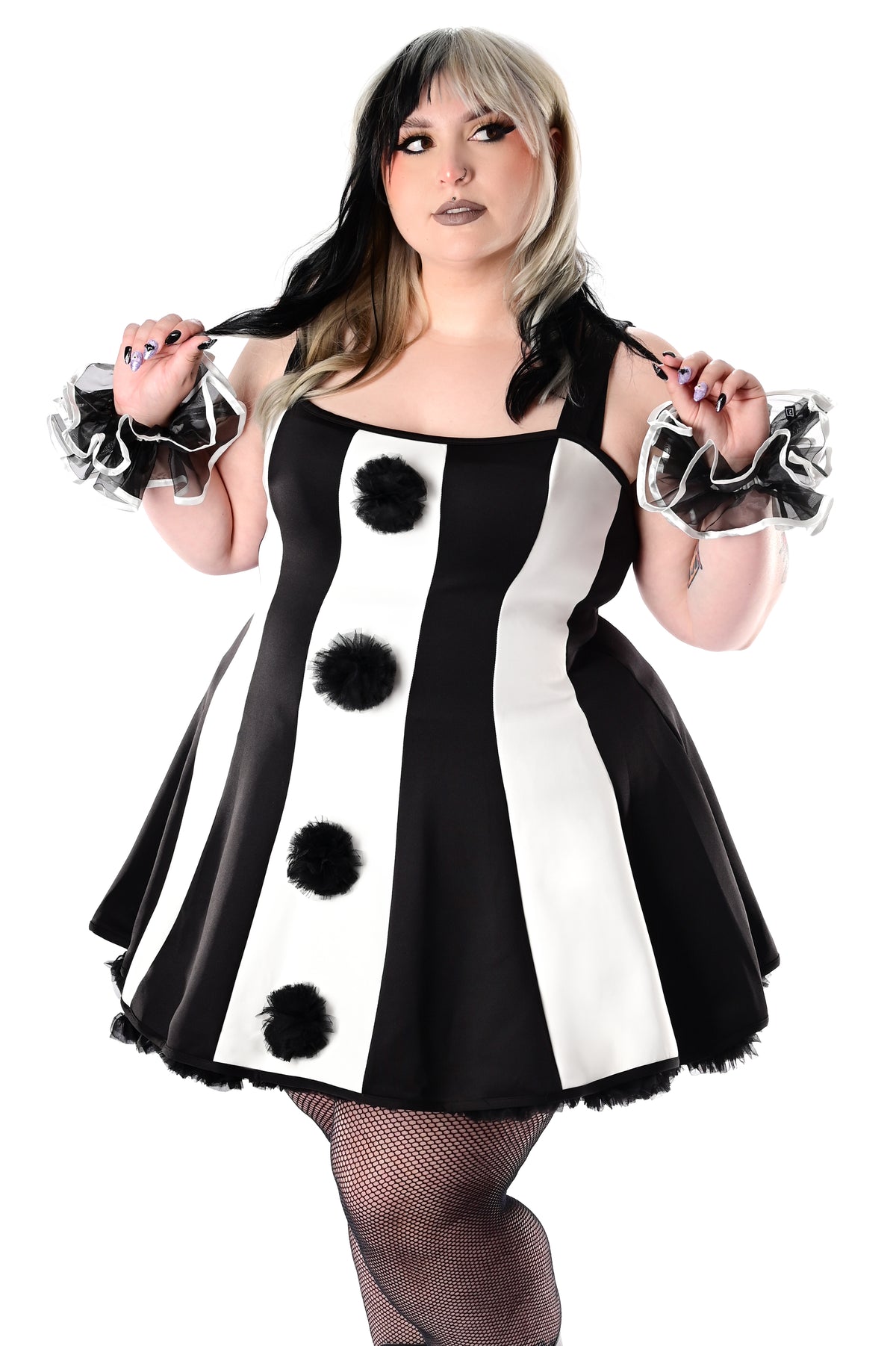 black and white striped clown dress with black tulle pom poms on front