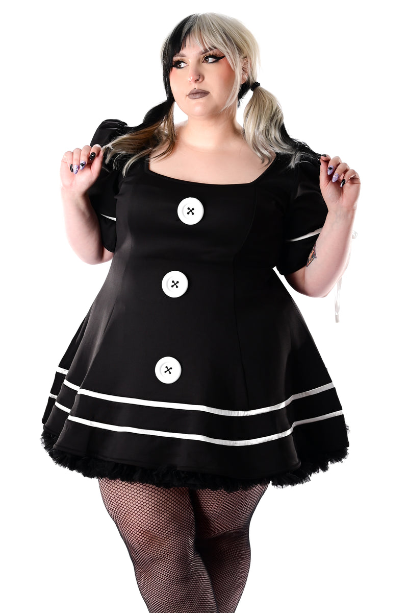 black puff short sleeve dress with white satin details and white oversized front buttons