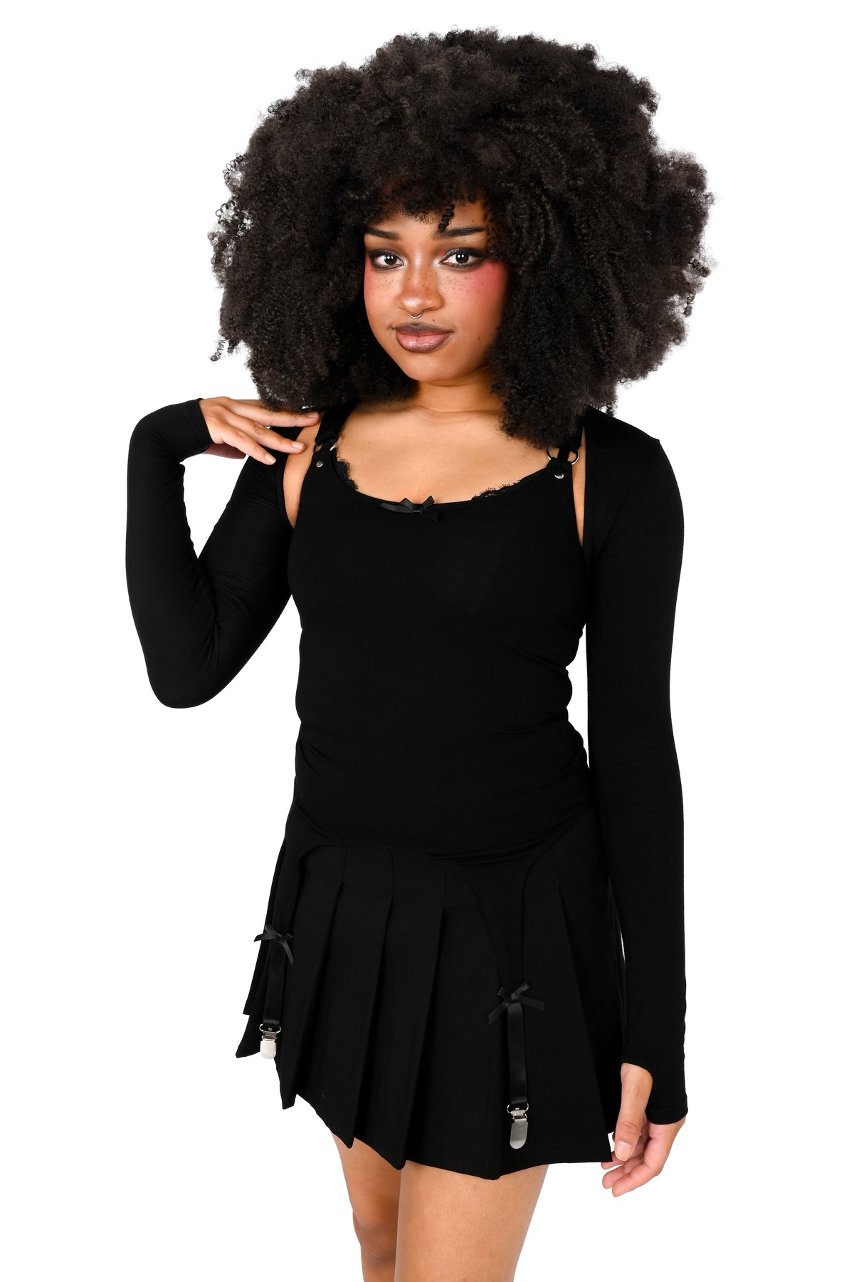 Cami tank top with adjustable garter detail on the bottom. O-ring and satin bow details.
