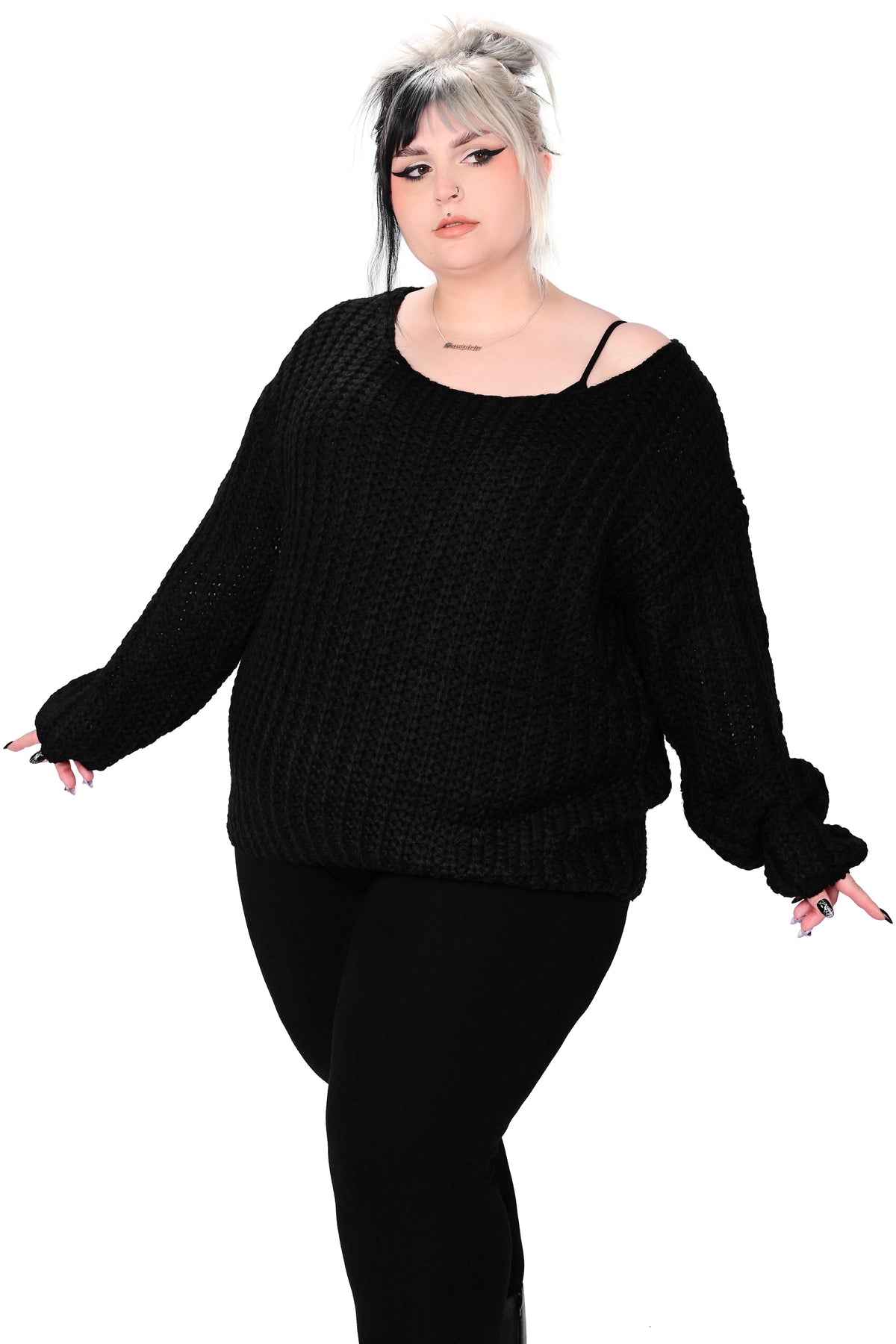 Soft, black pullover sweater with boat neckline