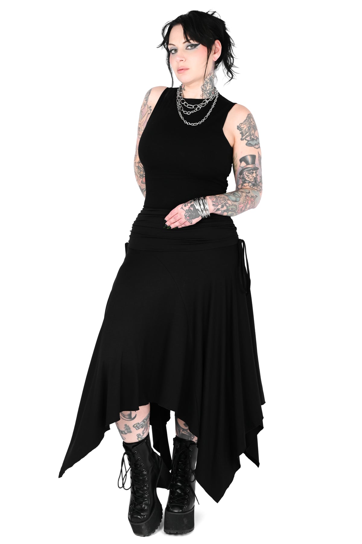 Black high/low handkerchief midi skirt with adjustable ties on the sides.