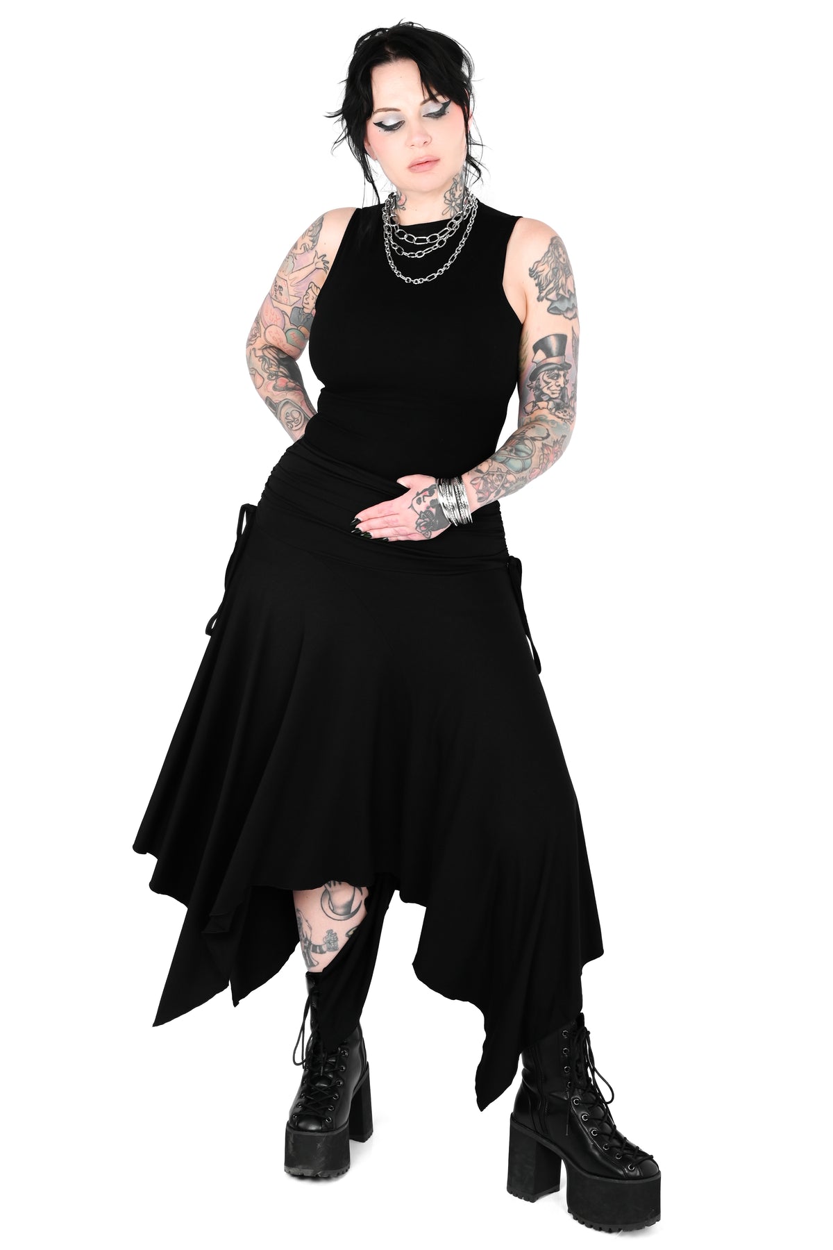 Black high/low handkerchief midi skirt with adjustable ties on the sides.