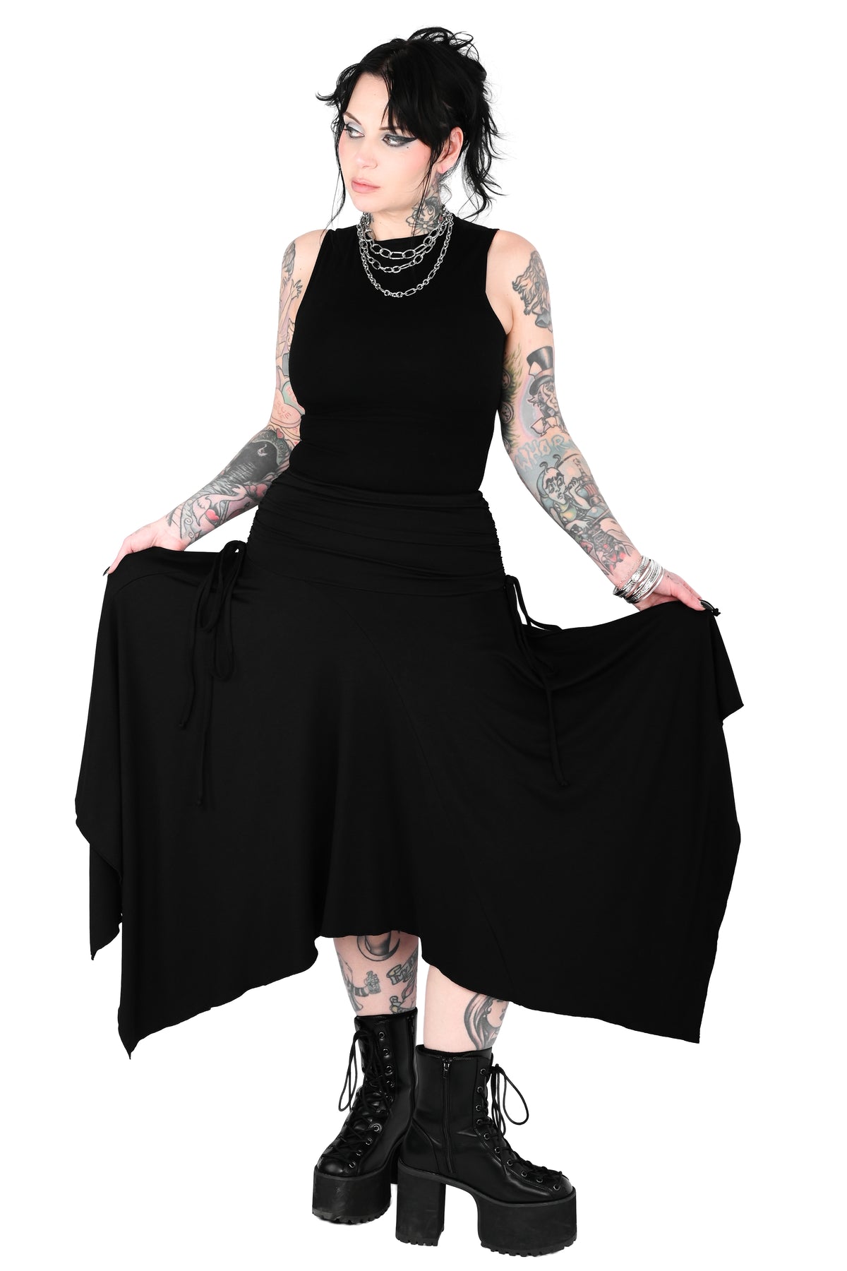 Black high/low handkerchief midi skirt with adjustable ties on the sides.