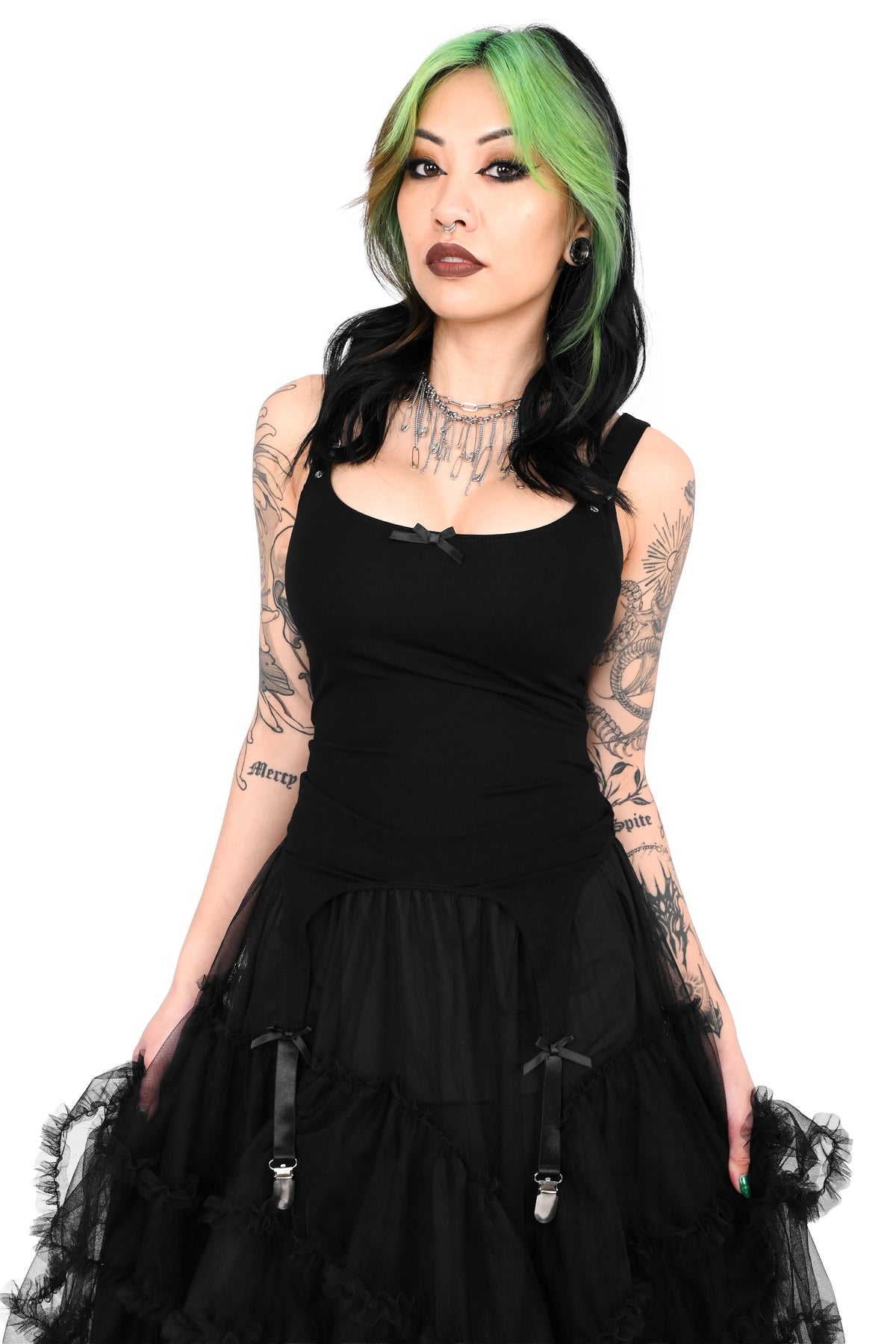 Cami tank top with adjustable garter detail on the bottom. O-ring and satin bow details.