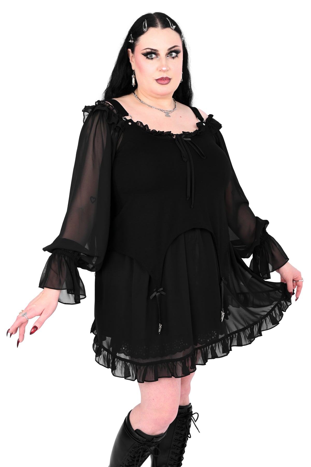 Cami tank top with adjustable garter detail on the bottom. O-ring and satin bow details.