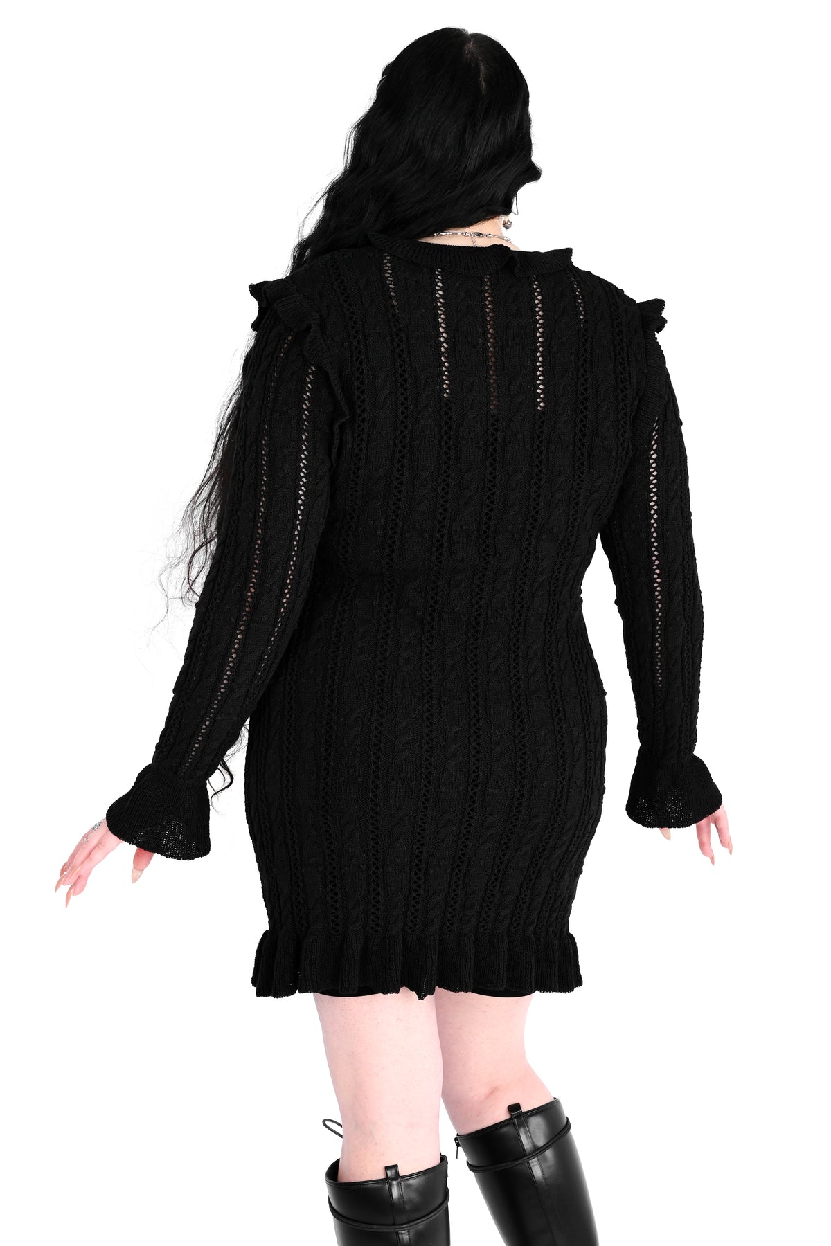 Black sweater dress with cute ruffly shoulders, bottom hem and tie neckline.
