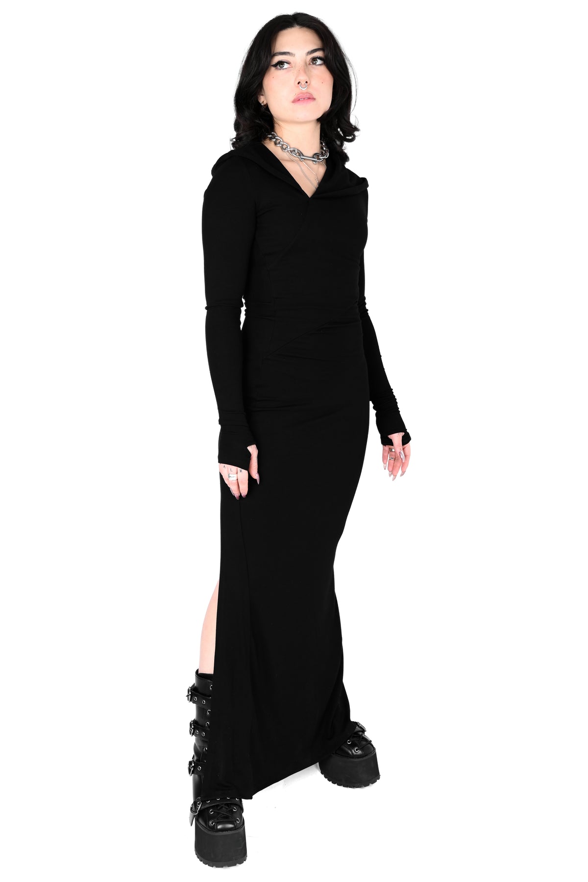 Black long sleeve maxi dress with an oversized hood and asymmetrical neckline.